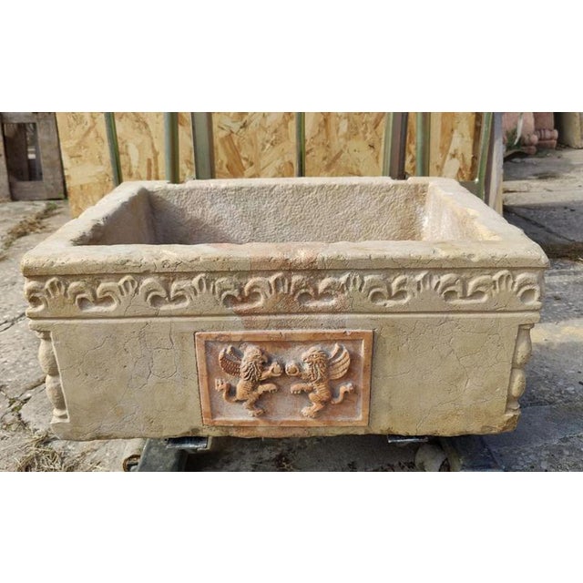 Fabulous, finely carved Botticino marble sink with a central inlay in red Verona marble, 20th century. from Venice,...