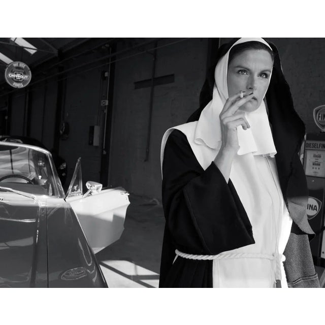 Alain daussin signed by the artist on the back and certificate format 40x50 cm baryta paper numbered /30 ex selling price...