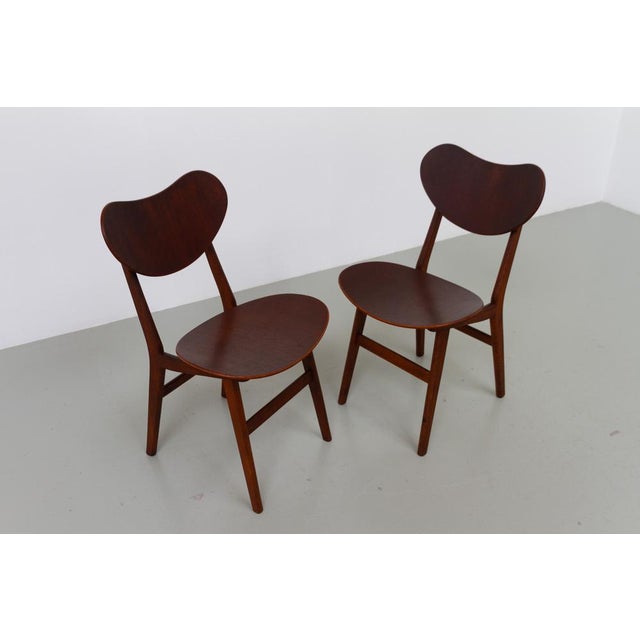 Pair of Danish Modern Oak and Teak Side Chairs, Denmark 1960s. Set of two sculptural Scandinavian Mid-Century Modern shell...