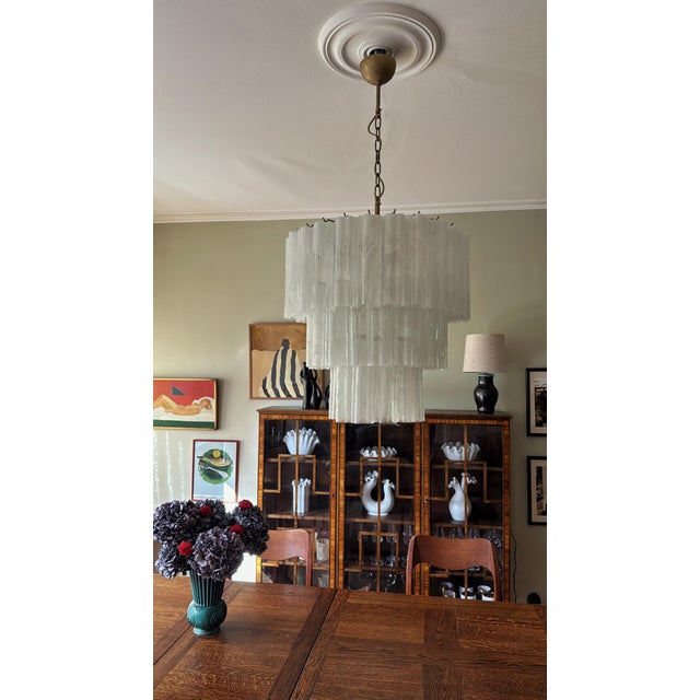 Set of two 2 white statement murano chandeliers with glass tubes in a swirled marble pattern in different white tones....