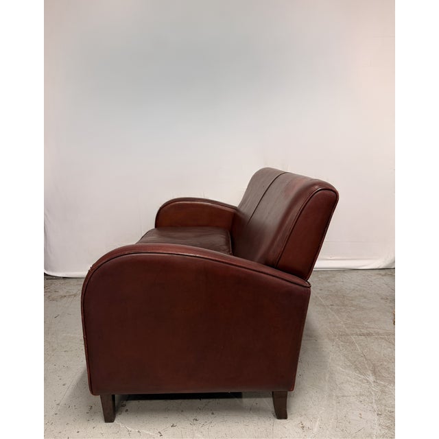 Classic design with beautiful art deco arms. The sofa does show some signs of wear commensurate with age and use but it is...