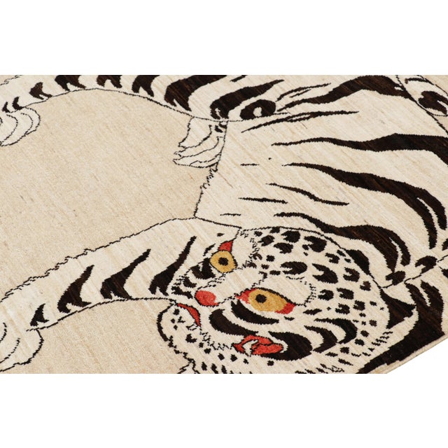 Hand-knotted in wool, this 4x5 modern tiger pictorial rug is a bold addition to the Rug & Kilim Tiger rugs line of their...