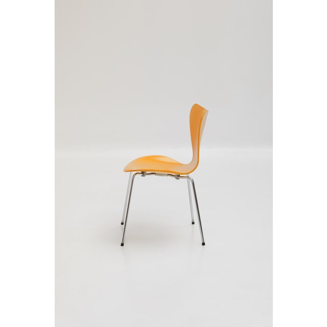 Series 7 chair, model 3107, designed by Arne Jacobsen in 1955 and produced by Fritz Hansen. It features a molded wood...