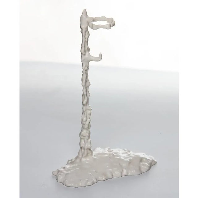 Alberto low candleholder by oscar tusquets dimensions: d 6 x w 10 x h 20 cm. Materials: cast iron painted in matte white....
