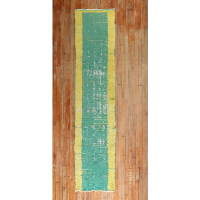Turkish Anatolian runner with a plain open field design in green and narrow bright yellow solid border. Measures: 2'3" x...