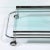 This well designed and proportioned Art Deco Streamline Three Tier Chrome and Glass Bar/Serving Cart with Removable Trays...
