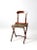 This late 19th century Readsboro Chair Mfg. Co. folding campaign chair features a turned wood frame, curved crest rail,...