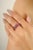 Elevate your collection with this captivating three-stone ring, handcrafted in luminous 14k white gold. Featuring a total...