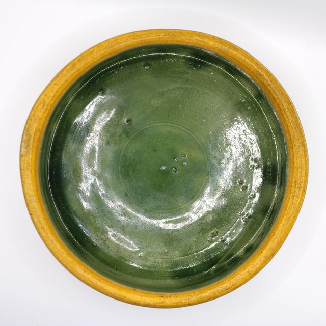 A highly collectible, heavy antique American yellow-ware stoneware pet dish dating back to the 1930s Art Deco era. This...