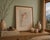 This piece features one of Hibel’s signature subjects—a delicately rendered child portrait, executed with soft tonal...