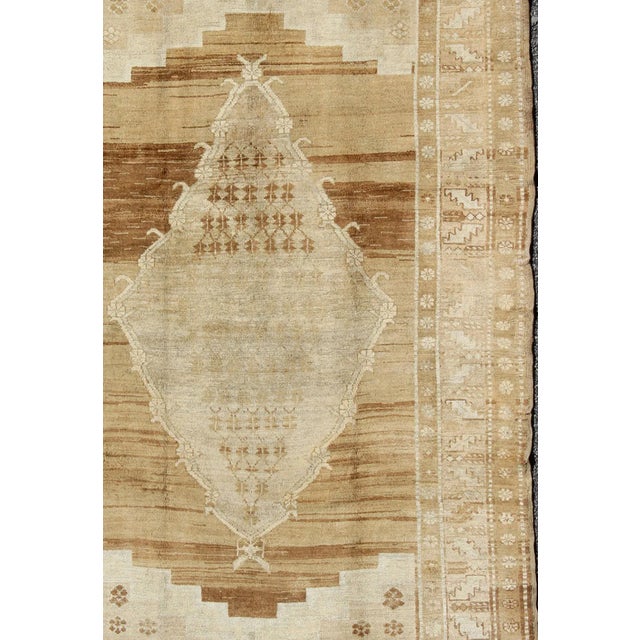 Midcentury vintage Turkish Kars rug with central medallion in brown and ivory, rug is-168, country of origin/type: Turkey,...