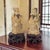 Pair of Chinese scholar or deity figures executed in resin material with finely engraved robe decoration highlighted in...