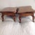 Two antique footstools. Size is 12" x 7". A rich honey colored wood (either walnut or maple). A pretty design - curved legs.