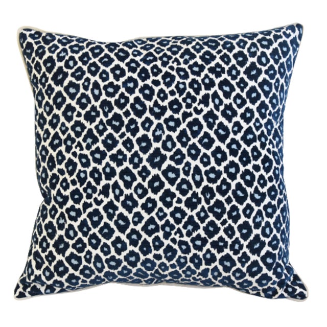 Large custom-tailored pillow in a woven cotton-blend fabric depicting blue-colored leopard spots in a soft chenille velvet...