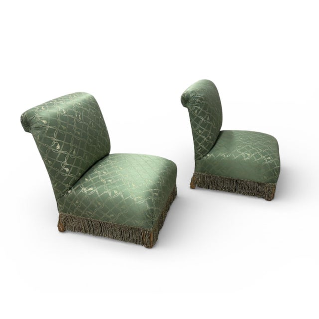 Slipper chairs, characterized by their low seat and armless design, gained popularity in the 18th and 19th centuries,...
