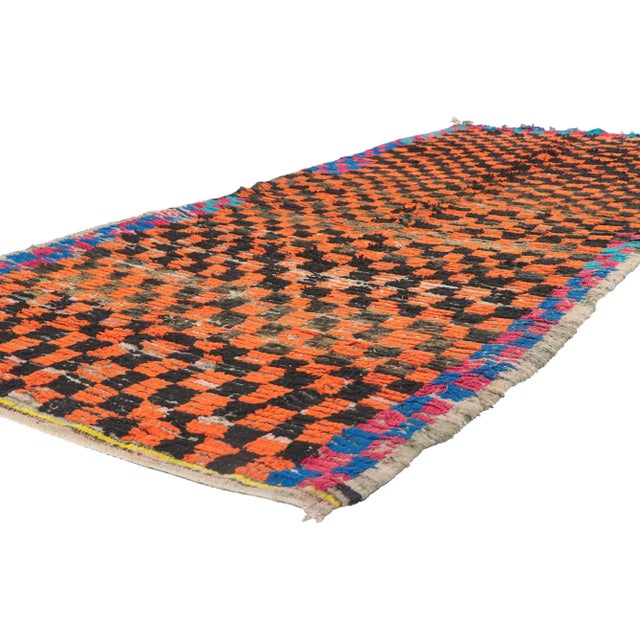 Vintage Berber Moroccan rug 04'02 x 09'00. Showcasing a bold expressive design, incredible detail and texture, this hand...