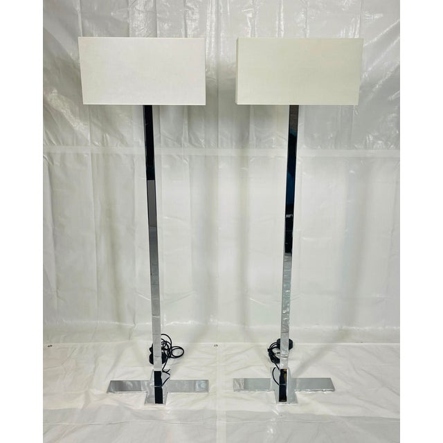 A refined and architecturally striking pair of “Leukon” CL2 floor lamps designed by Antonio Citterio for Maxalto (B&B...