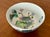 Vintage Chinese porcelain bowl, hand-painted with elegant lotus flowers and cranes on both its interior and exterior. In...