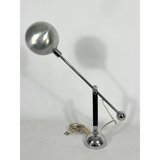 Good vintage condition with normal trace of age and use for this chrome and brushed aluminum table lamp produced in Italy...