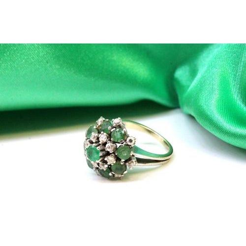 White gold ring with (16) brilliant-cut diamonds and calibrated emeralds. Metal: Gold. Origin: Portuguese. Brand: Formiga....