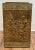 Crafted in France and rectangular in shape, the wood and brass waste bin is decorated with a repousse figural scene to...