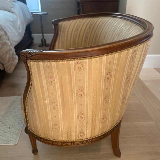 This antique French Settee is designed in the Louis XVI style, dating to late 19th century or early 20th century.the piece...