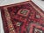 Islamic Vintage Afghan Hand-Knotted Wool Runner Rug | Tribal Red & Black Geometric Rug For Sale - Image 3 of 10