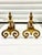 Antique pair of 17th-century fireplace andirons with turned brass finial tops and scrolled brass feet featuring an...
