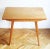 This Mid Century Modern coffee table is made of solid Ash, and has a beautiful grain and elegant tapering table legs. The...