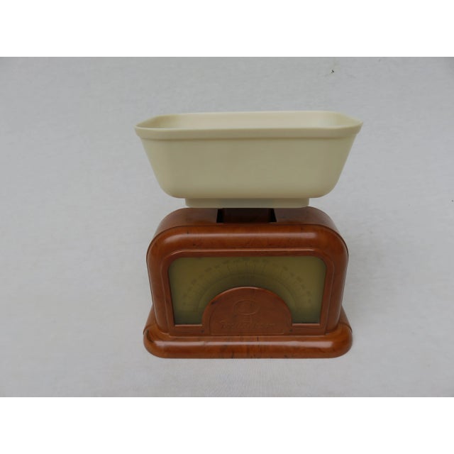 Scales, kitchen scales from the 30 years, designated Dr. Oetker D.R.G.M, Bakelite and celluloid The body is mottled light...