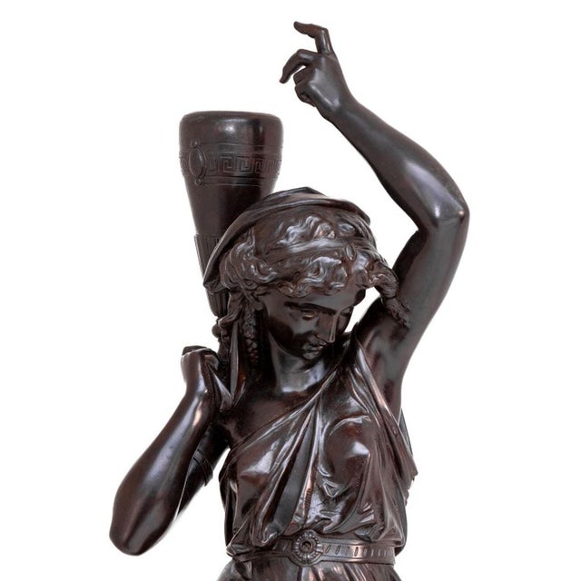 French School, The Water Carrier, Patinated Bronze Sculpture, late 19th century, depicting a classical female upholding a...