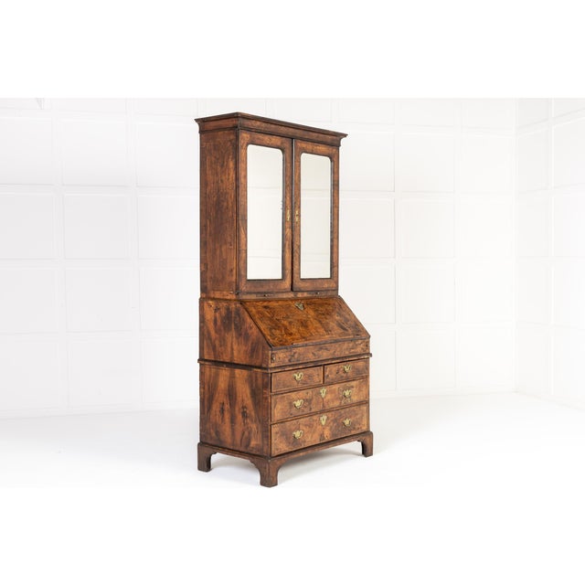 Early 18th century english george i walnut bureau bookcase an early 18th century english george i walnut bureau bookcase...