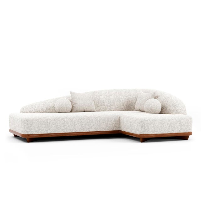 Frame handcrafted of solid wood with reinforced, corner-blocked joinery; Topped with foam and Polyester Wadding. Equipped...