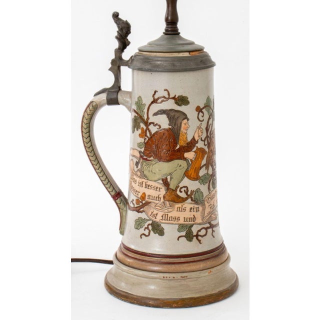 German Bier Stein Mounted as a Lamp. 25" H x 6" Diameter. Provenance: From a New York City Collection.