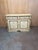 Italian Provincial sideboard by Century Furniture, featuring a softly distressed painted finish with hand-painted floral...
