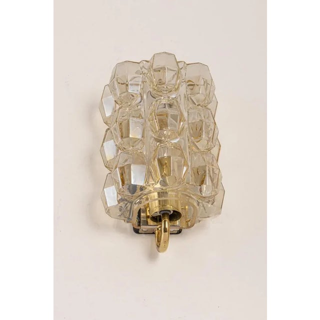 Wonderful large golden wall light, from limburg glashütte, germany, circa 1960-1970. Smoked bubble glass on a golden brass...