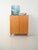 Scandinavian 1950s birch cabinet, featuring bright grain and interiors with natural wood drawers and shelves. Scandinavian...