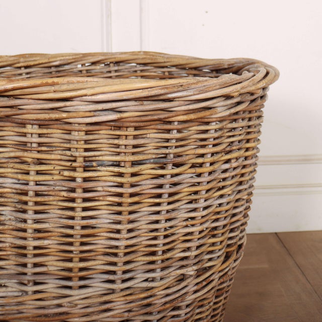 Large 1930's English wicker log basket. Internal reference: H This piece is designed in the style of the selected designer...