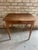 Antique wooden side table with a single drawer. The drawer is fully functioning with a round brass knob. This primitive...