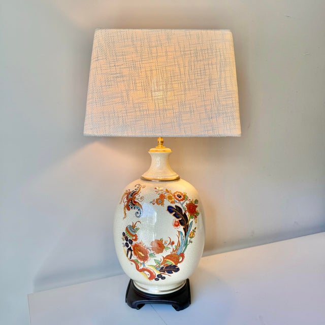 Vintage tobacco leaf style table lamp. Paired with a rectangle boucle lampshade.