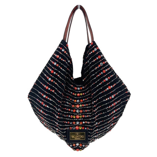 Valentino Black Suede Rhinestone Beaded Tote in good condition. Black suede exterior trimmed with multi color rhinestones...