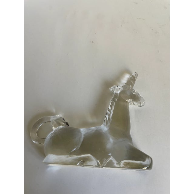 Here is a lovely glass paperweight in the form of a unicorn. The front of the piece has all the dimensions of a unicorn,...