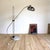Impressive, large floor lamp with an extendable chrome arc on a marble base (with a small chip on the base). The arc is...