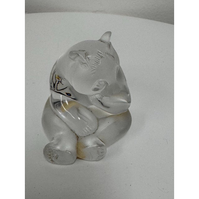 Design Plus Gallery presents the Crystal Panda Sculpture from Lalique. This collectible crystal figure depicts a seated...