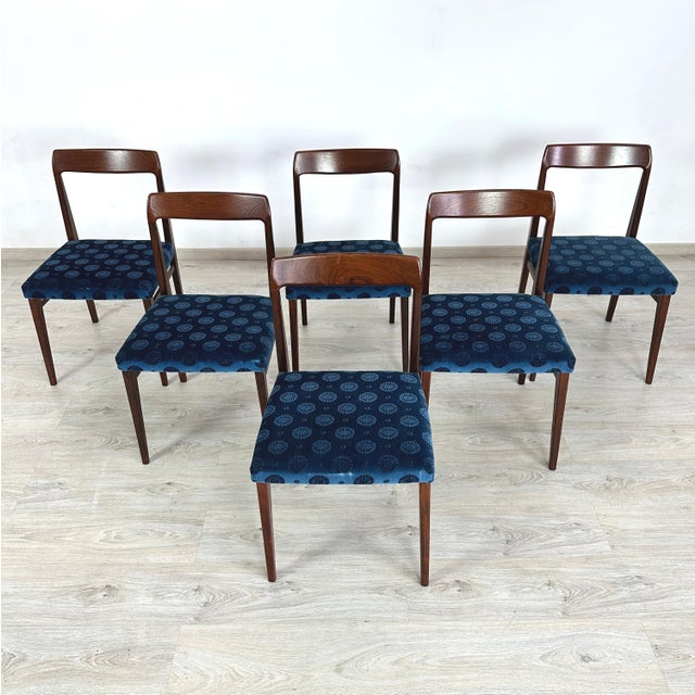 Dimensions: H 30.5” x W 18” x D 19.3” x SH 19” Set of 6 Vintage German dining chairs from Lübke with original blue fabric...