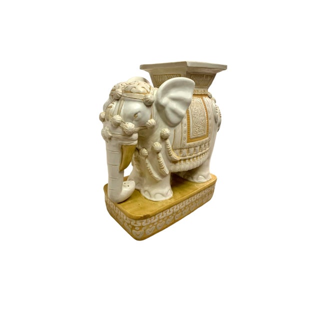 Vintage white ceramic elephant garden stand for indoor/outdoor use. Doubles as plant stand or end table. Condition: This...