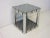 A handcrafted 1970's sculptural chromed steel side table with square and circle designs , this Op Art styled piece has all...