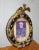 Gorgeous Picture in Good Vintage Condition. There are breaks to the ceramic Gold Ribbon which is almost unnoticeable....