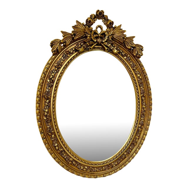 Italian Rococo Oval Wall Mirror With Floral Gold Leaf Frame For Sale