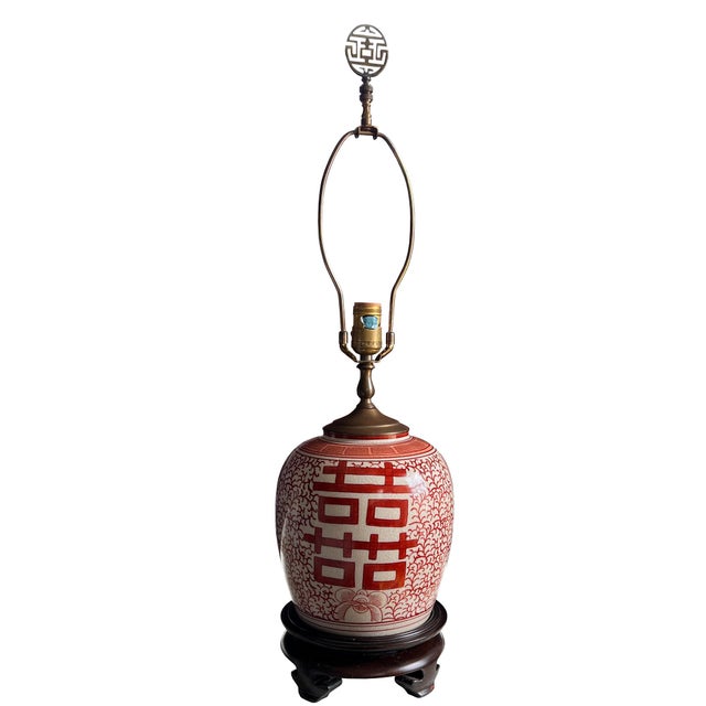 A striking and highly decorative pair of Chinese porcelain ginger jar lamps featuring the auspicious “Double Happiness” (囍...